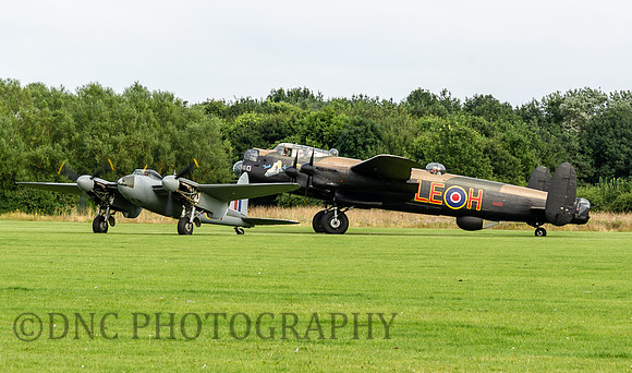 Avro Lancaster Mk VII, NX611 & De Havilland Mosquito NF11 HJ711 taxi together.
