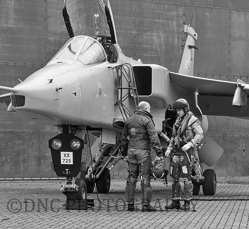 Pilots discuss the sortie.