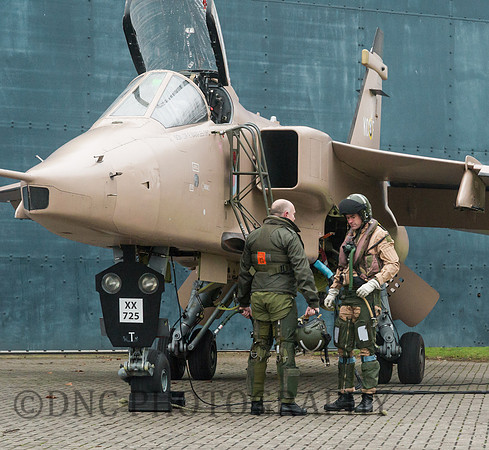 Pilots discuss the sortie