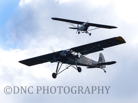 Fieseler Storch 6G-ED chased by Piper L4H Cub
