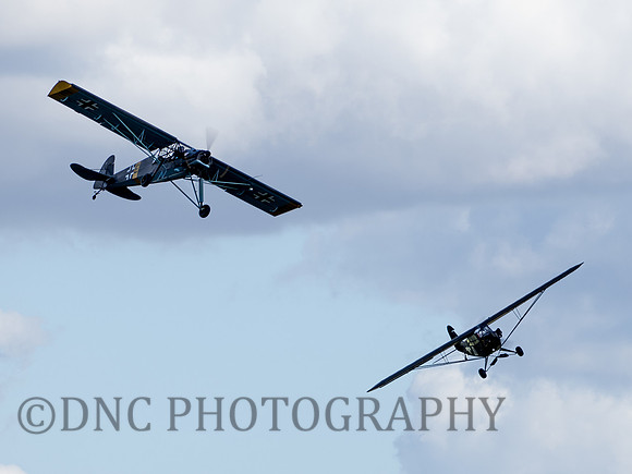 Fieseler Storch 6G-ED chased by Piper L4H Cub
