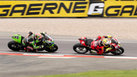 Alvaro Bautista Ducati Panigale V4R leads Jonathan Rea Kawasaki ZX-10RR Super Pole Race