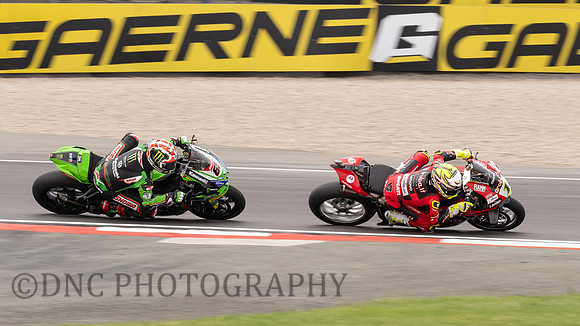 Alvaro Bautista Ducati Panigale V4R leads Jonathan Rea Kawasaki ZX-10RR Super Pole Race