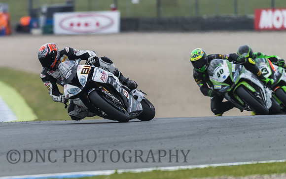 Jordi Torres BMW S1000RR leads Román Ramos Kawasaki ZX-10R Anthony West Kawasaki ZX-10R