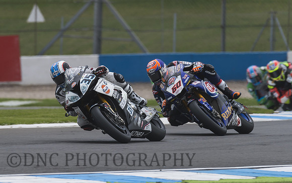Raffaele de Rosa Althea BMW S1000RR leads Michael Van Der Mark Pata Yamaha YZF R1