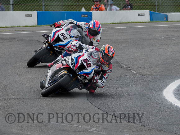 Michael van der Mark leads Tom Sykes both BMW M1000RR