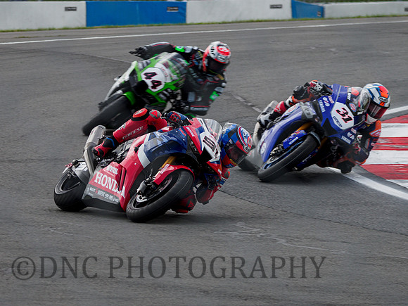 Leon Haslam HRC Honda CBR1000 RR-R leads Garrett Gerloff PATA Yamaha YZ-F R1 & Luca Mahias Pucetti Kawasaki ZX-10RR