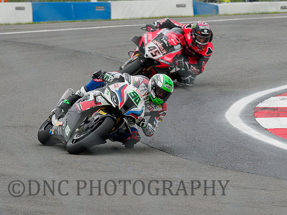 Eugene Laverty RC Squadra Corse BMW M1000RR leads Scott Redding Aruba.it Ducati Panigale V4 R