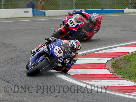 Garrett Gerloff GRT Yamaha YZ-F R1 leads Leon Haslam HRC Honda CBR1000 RR-R