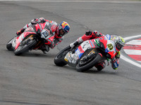 Alex Bassani Motocorsa Racing Ducati Panigale V4 R leads Michael Rinaldi Aruba.it Ducati Panigale V4 R