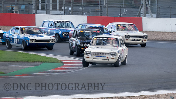 1 Stephen Primett Ford Escort Mk1 leads P83 1 lap Race 2