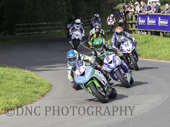 Dean Harrison leads at the start of the Junior A race.