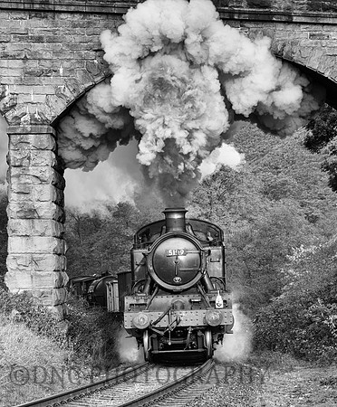 Large Prairie 5199 paases under the bridge at Darnholm.