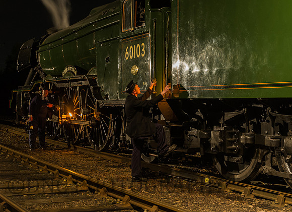 Crew prepare their engine