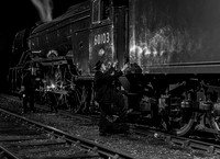Crew prepare their engine.