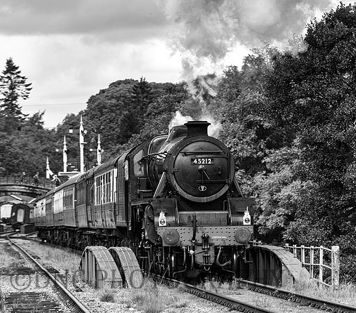 Black 5 45212 departs Goathland.