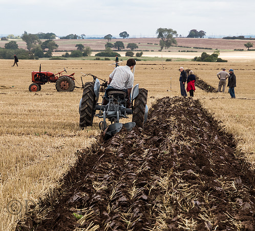 Vintage tractor ploughing.