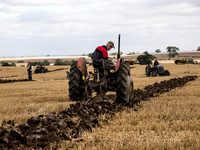 Vintage tractor ploughing