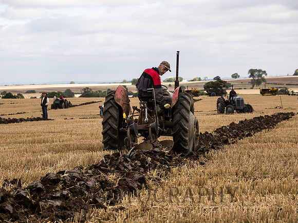 Vintage tractor ploughing