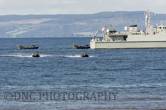 HMS Pembroke and landing craft