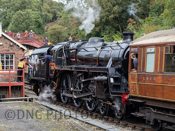 BR Std 5 73156 at Goathland Station as the fireman exchanges the token