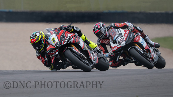 Kyle Ryde Nitrous Competitions Racing Ducati Panigale V4R leads Scott Redding Hager PBM Ducati Panigale V4R race one