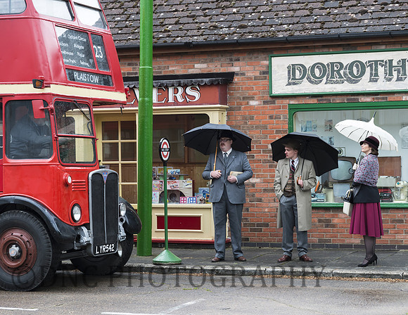 Bus arrives as it starts to rain