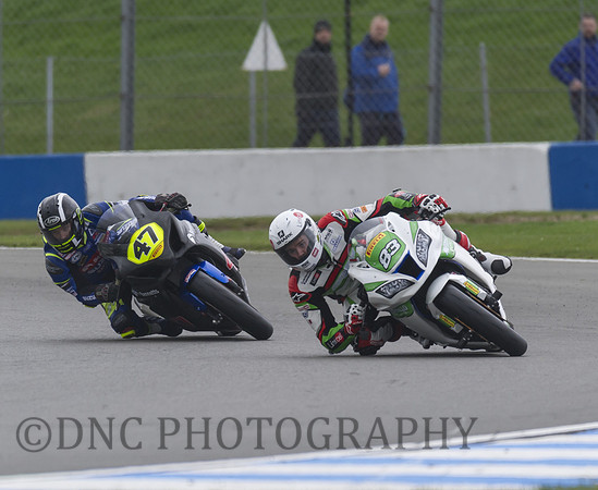 Danny Buchan Merello Racing Kawasaki leads Richard Cooper Bennetts Suzuki