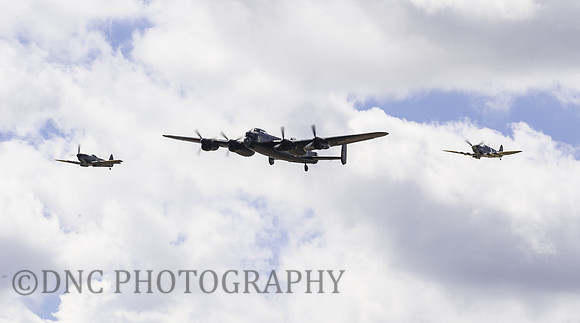 BBMF Lancaster B1 PA474 flanked by (R) Spitfire TE311 (Mk LF XVIE) (L) Spitfire AB910 (Mk Vb)