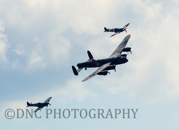 BBMF Lancaster B1 PA474 'City of Lincoln' flanked by (R) Spitfire TE311 (Mk LF XVIE) (L) Spitfire AB910 (Mk Vb)