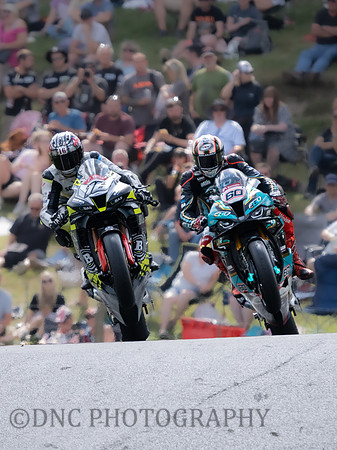 Luke Hopkins Black Onyx Security Honda & Peter Hickman FHO Racing BMW creast the mountain