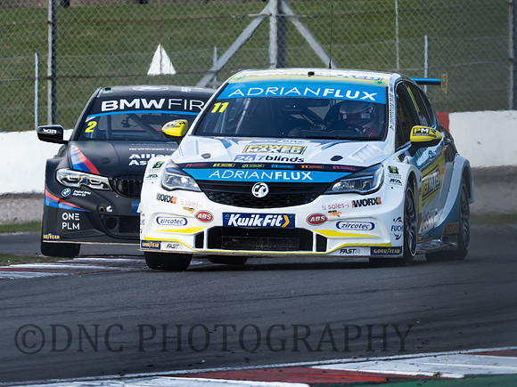 Jason Plato Adrian Flux with Power Maxed Racing Vauxhall Astra leads Colin Turkington BMW