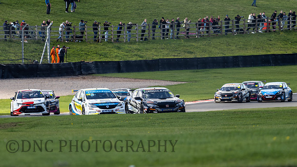 Gordon Sheddon Halfords Racing with Cataclean  leads lap 1 race 1 through Shwantz Curve.
